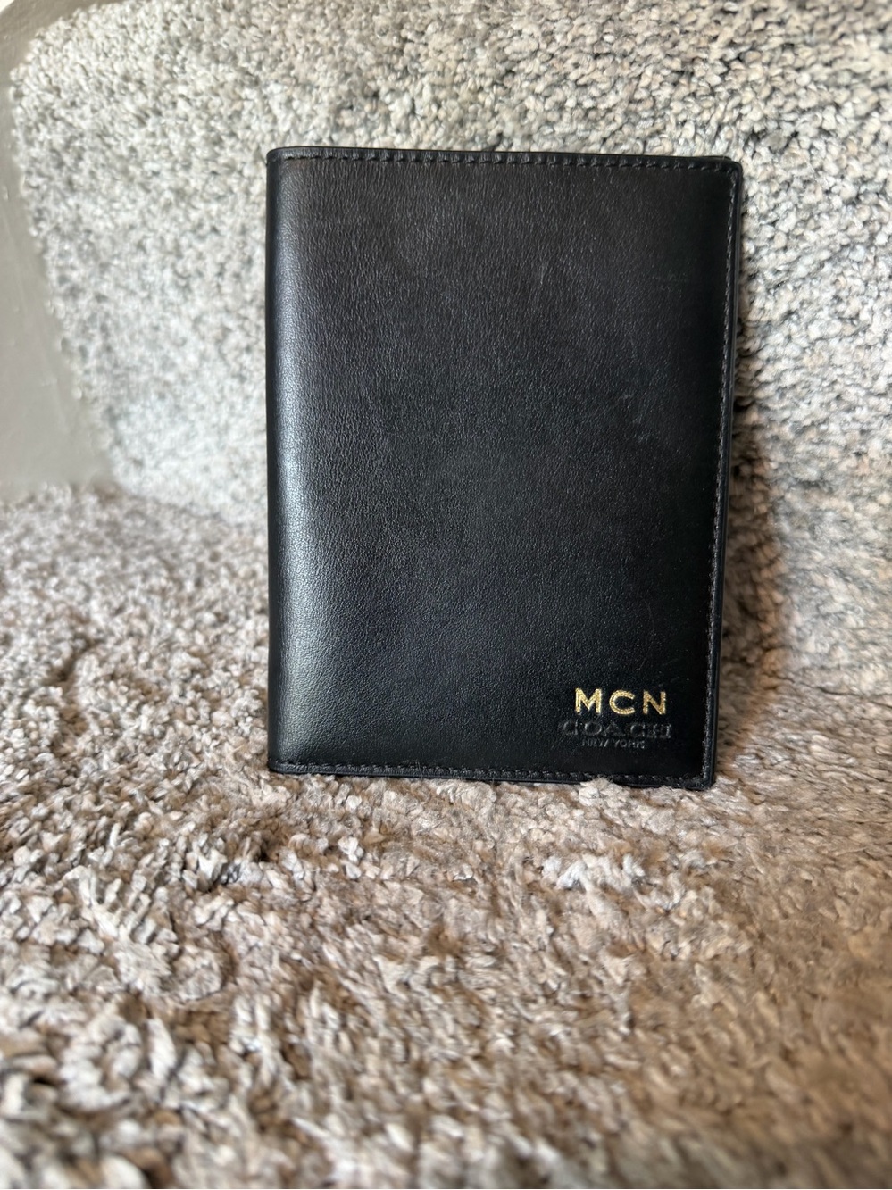 Coach Slim Passport Wallet/Case crafted in black refined leather